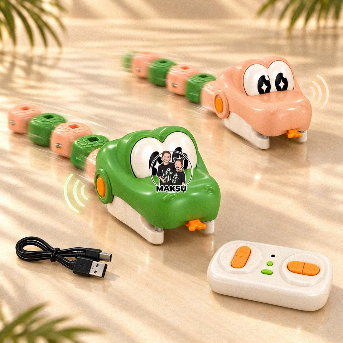 Green and cream remote control snakes with sound on the move, shown with remote and USB charging cable
