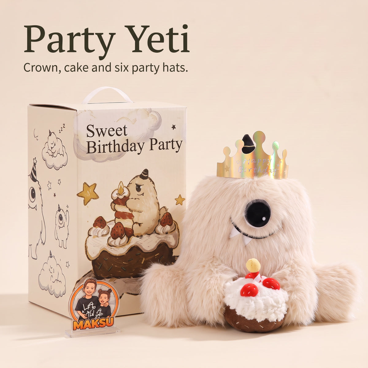 Party Yeti بتاج وكعكة عيد ميلاد من القماش بجانب علبة الهدية